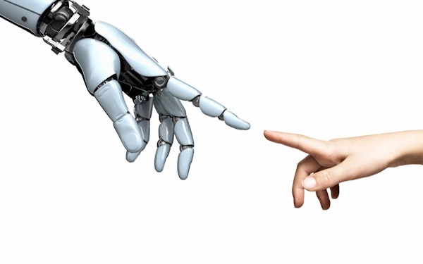A robot hand and a human hand reach out with their pointer fingers almost touching.