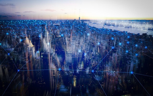 A skyline view of a city with network nodes superimposed.