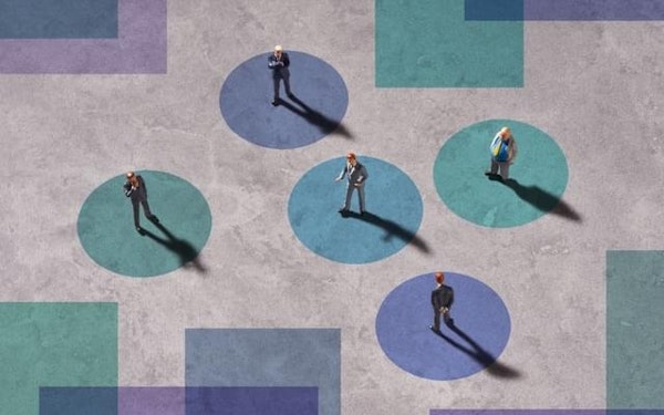 A graphic illustration of interconnected businesspeople standing in circles against a color-blocked background.