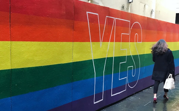 A rainbow mural with the word "Yes" on it.
